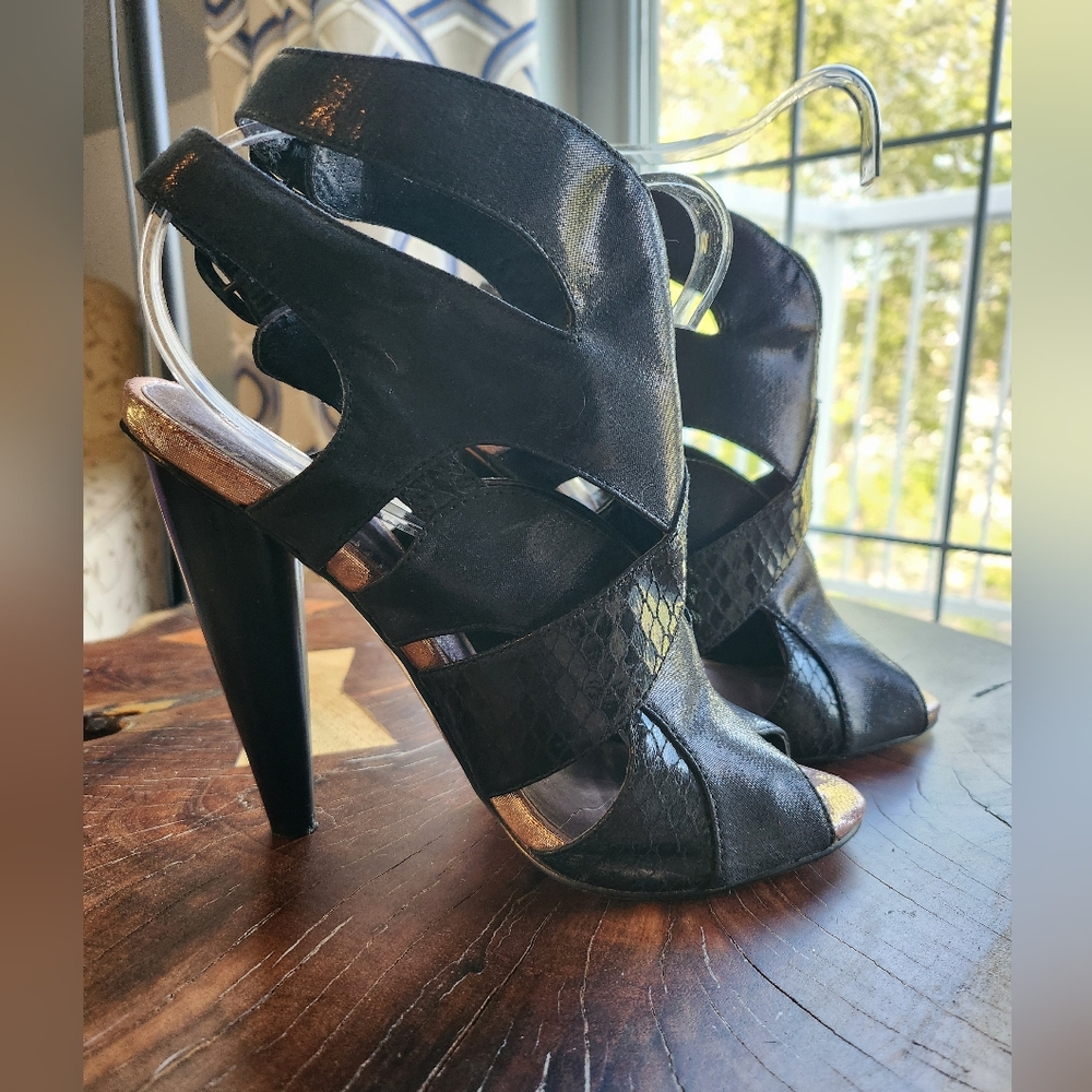 Ladies black leather and snake gladiator shoe